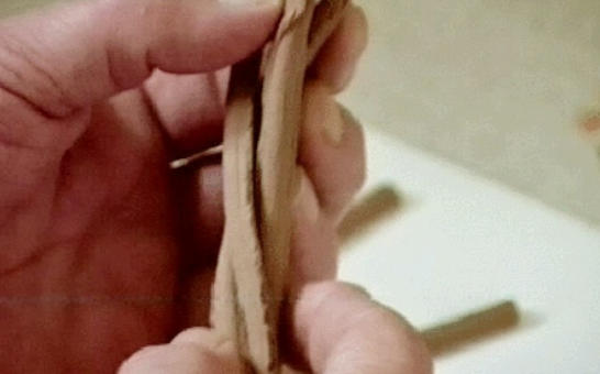 Image of plasticine being plaited