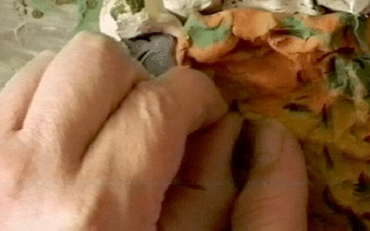 Image of plasticine being pinched